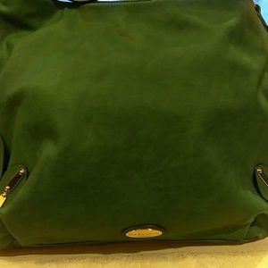 A green big Buddha purse